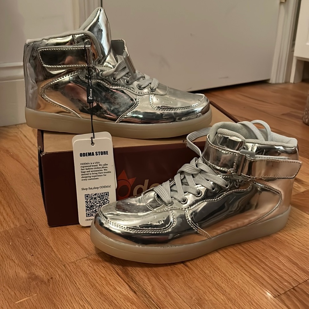 Brand new, never been worn silver high tops with LED light-up soles US size 8